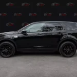Land Rover Discovery Sport 2018 чорний вид збоку для оренди