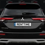 Mitsubishi Outlander 2022 чорний вид збоку для оренди